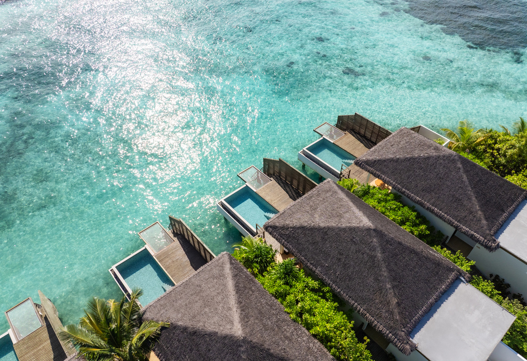 Villas beside the clear waters of the island lagoon